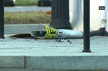 Man taken into custody after driving his car into security gate outside White House, authorities say